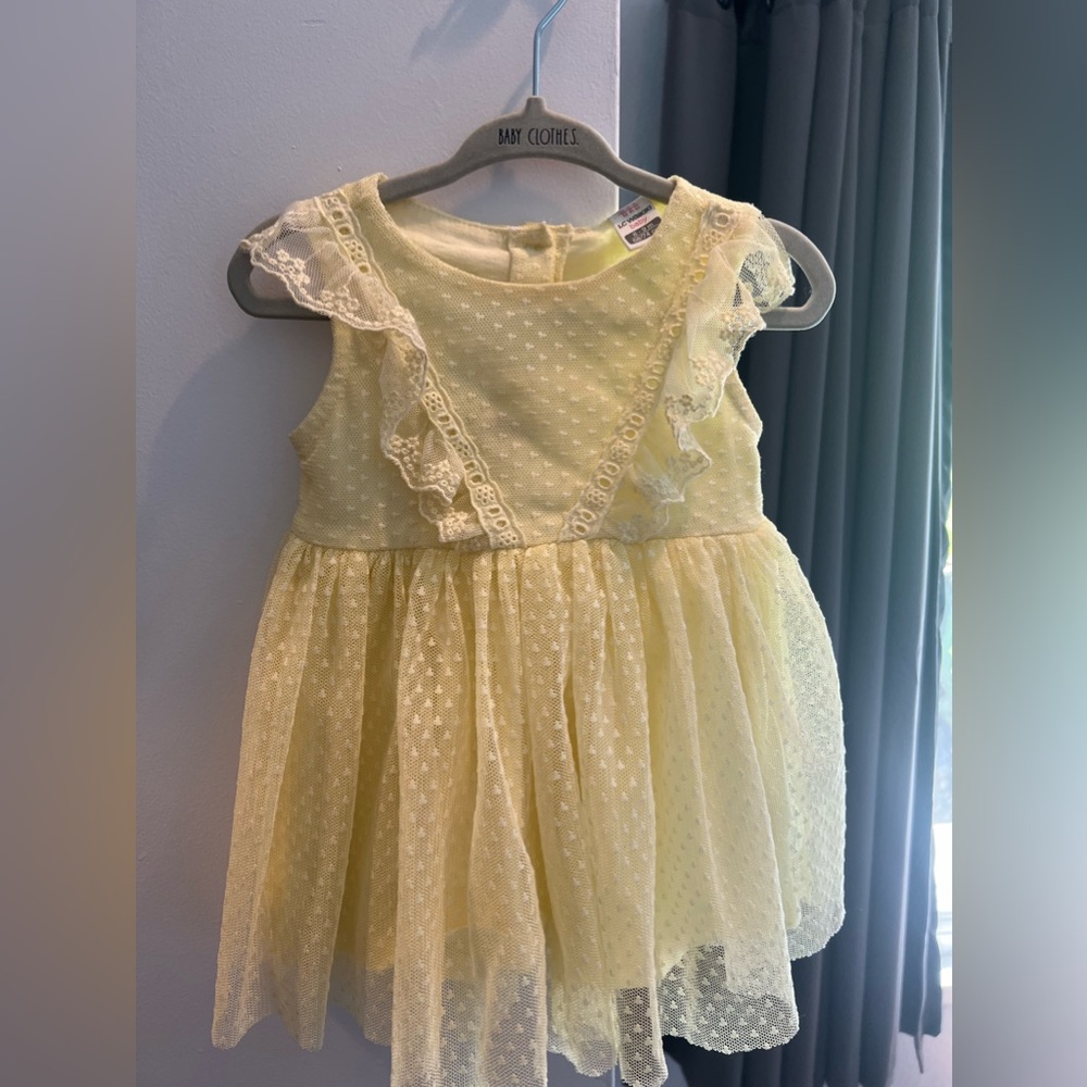 Yellow tulle dress.